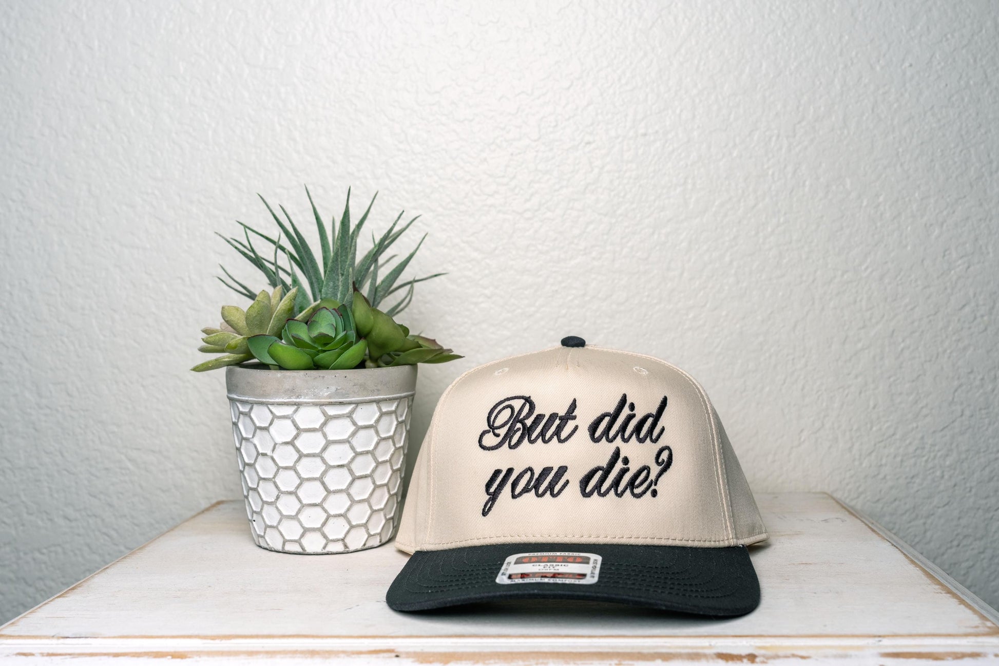 but did you die?, Embroidered snapback trucker hat