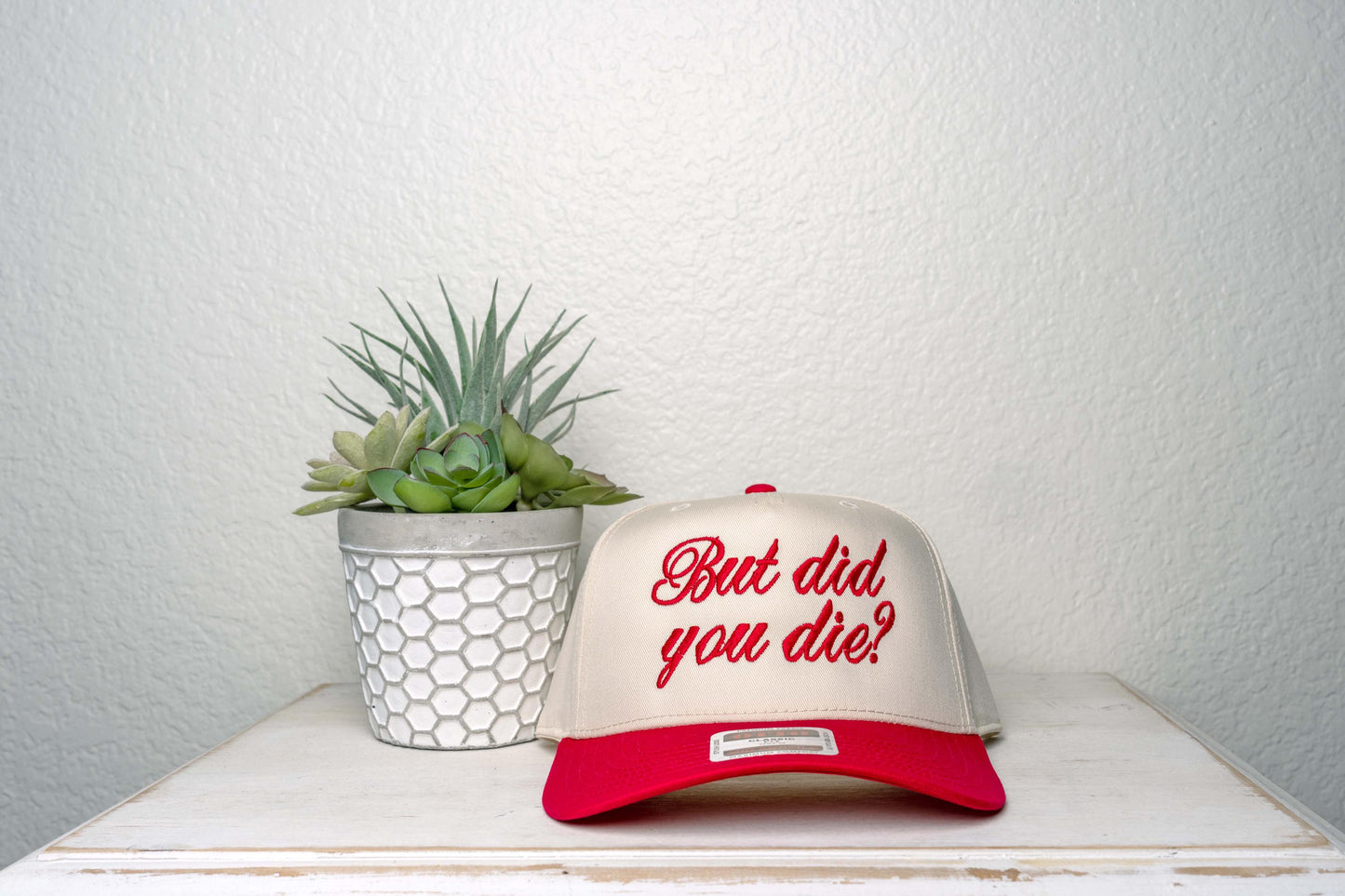 but did you die?, Embroidered snapback trucker hat